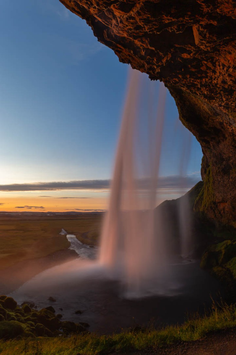 Under the waterfall