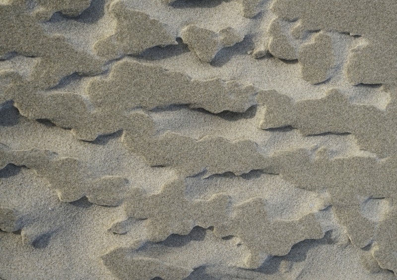 Abstract zandschilderij