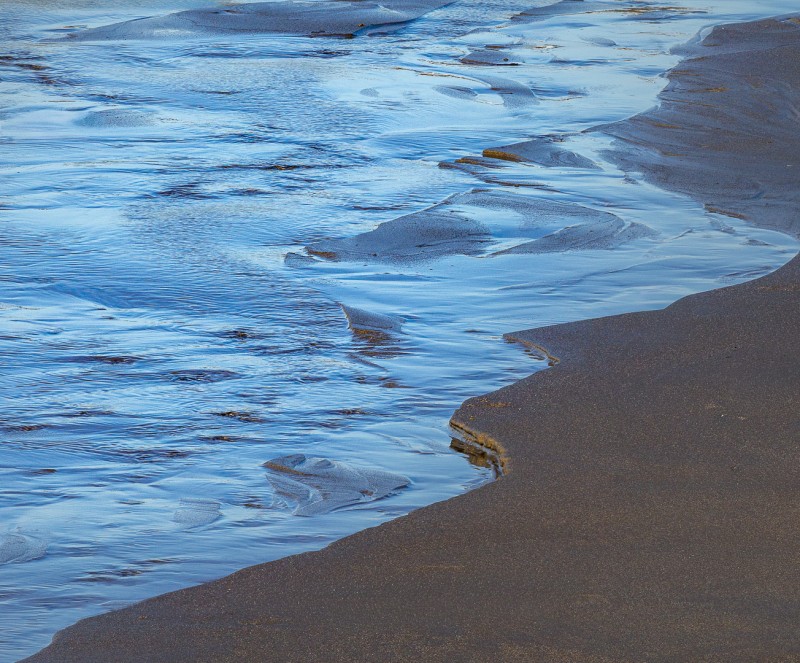 Divided by sand and sea